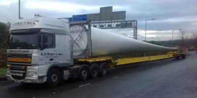Vestas V 126 Turbine blade awaiting Police escort from Motorway services